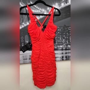 Red fitted drappery style dress